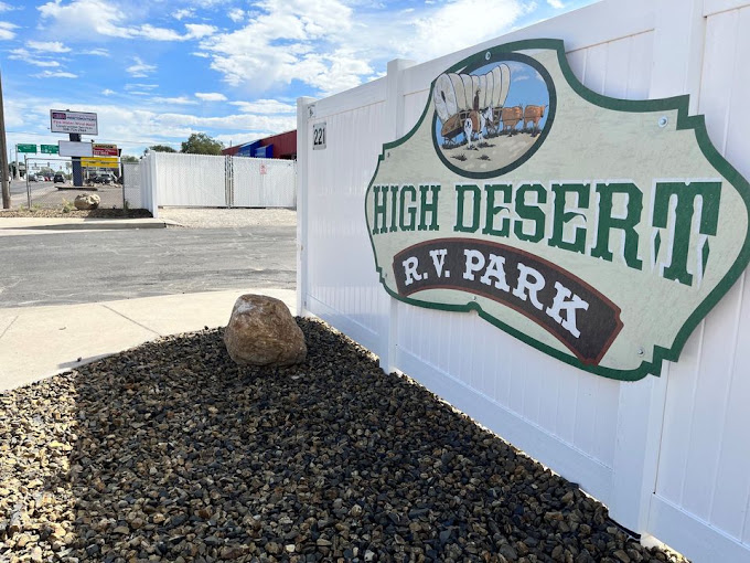 The hand-painted High Desert RV Park entrance sign along Addison West in Twin Falls